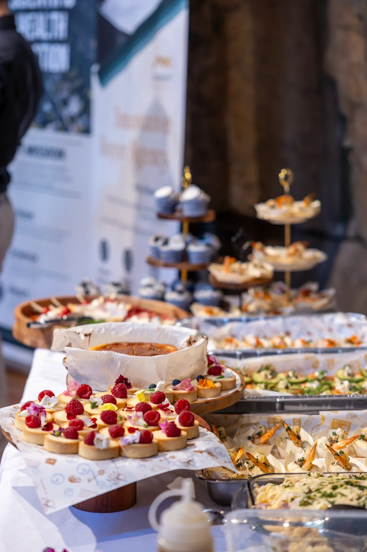 A festive spread of desserts and appetizers on a table.